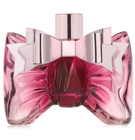 perfume in pink bow bottle.